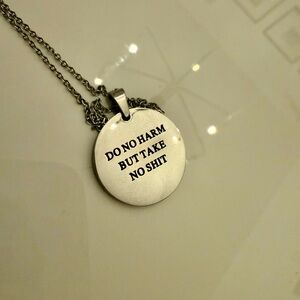 Empowering Silver Pendant Necklace